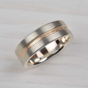 sterling silver and 18ct red gold ring