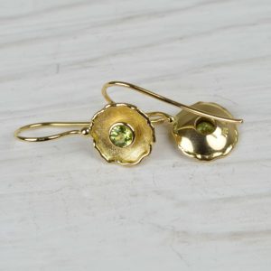 18ct gold earring with peridots