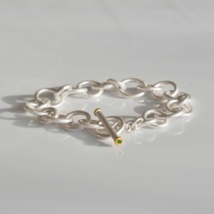fine silver and fine gold bracelet with tsavorites
