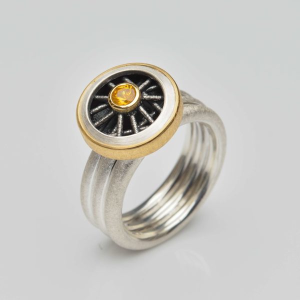 sterling silver and 22ct gold ring with yellow sapphire