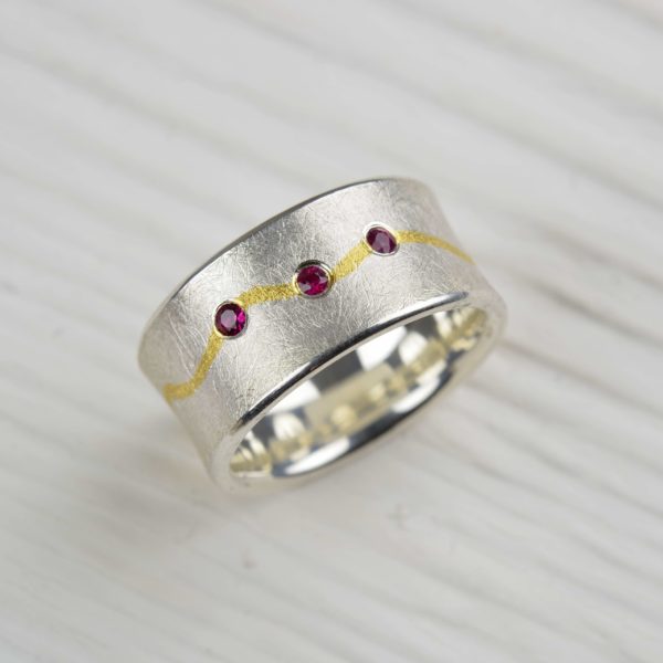 sterling silver and fine gold ring with rubies