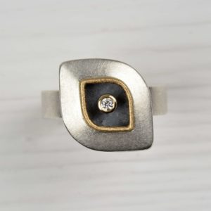 sterling silver and 18ct rose gold ring with diamond