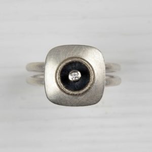 sterling silver and 18ct white gold ring with diamond
