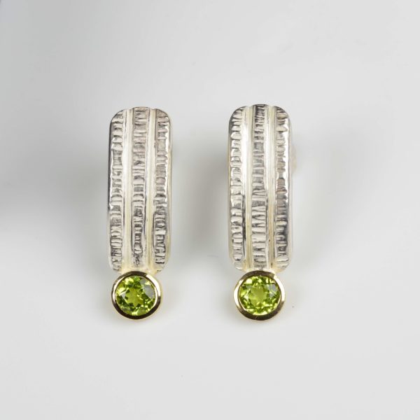 sterling silver and 18ct gold studs with peridots