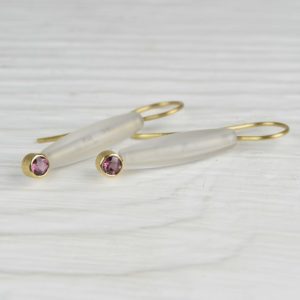 18ct gold earrings with rhodolite and rock crystal quartz