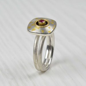 sterling silver, 18ct gold and fine gold ring with ruby