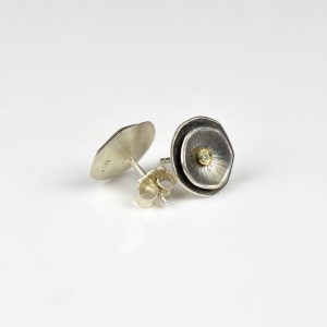 silver and 18ct gold studs with diamond