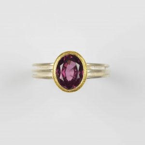sterling silver and 22ct gold ring with rhodolite