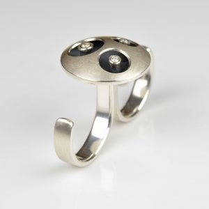 sterling silver double ring with diamonds