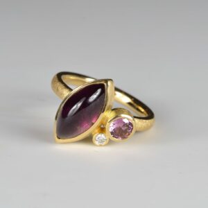 18ct gold red tourmaline, rhodolite and diamond cluster ring