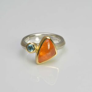 Silver and 18ct gold mandarin garnet and zircon ring