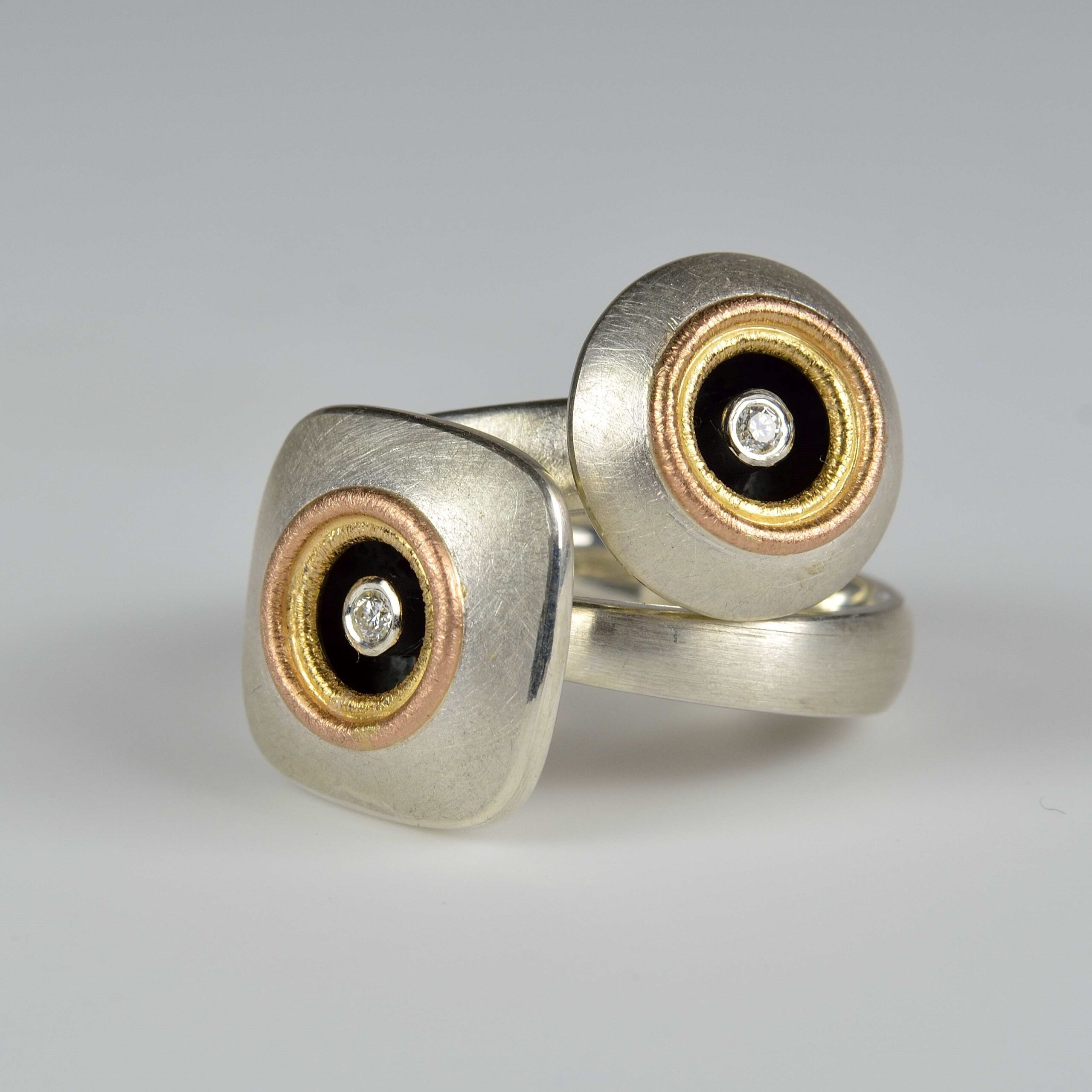 sterling silver and 18ct red, rose gold ring with diamond